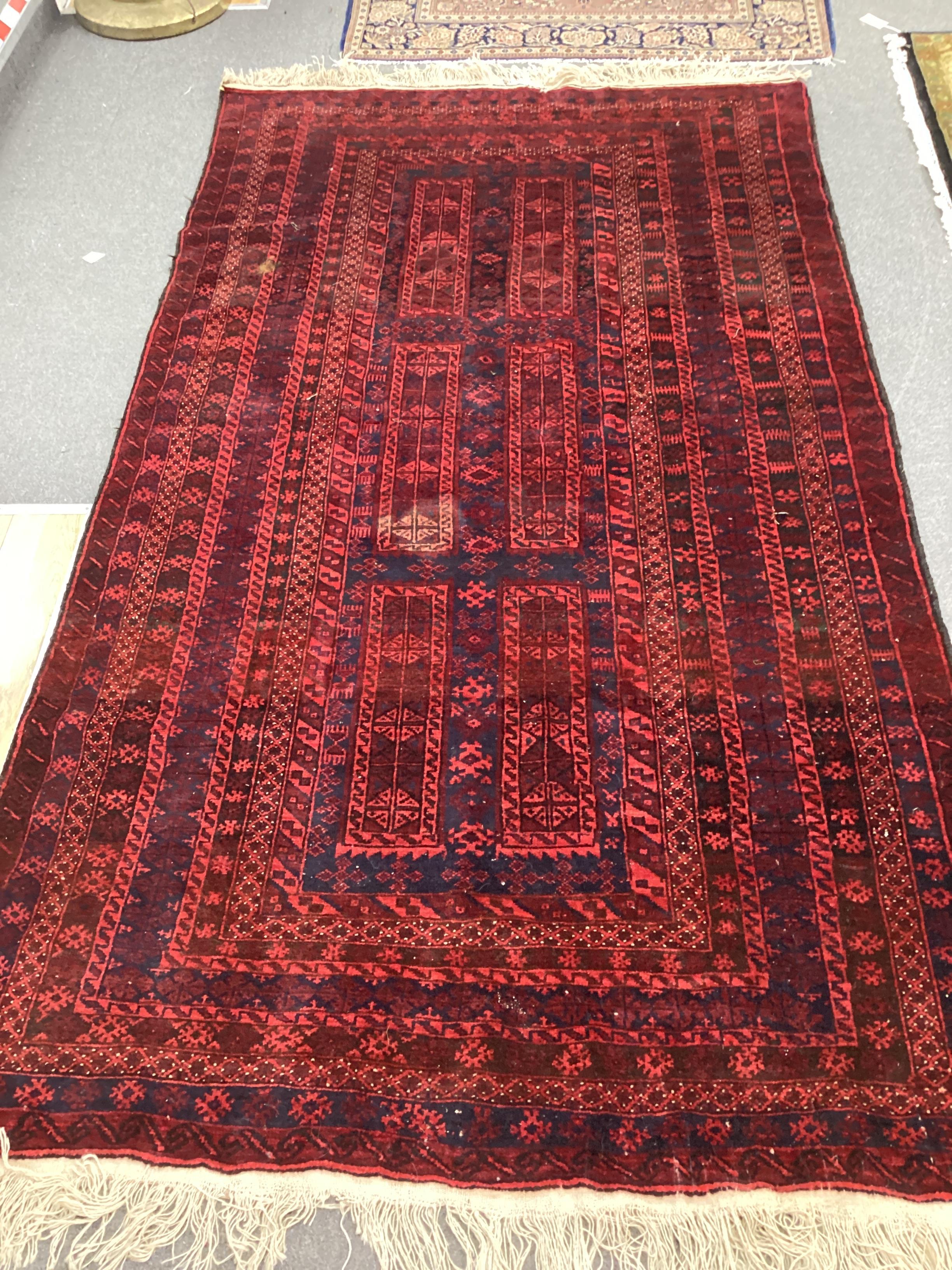 A Belouch blue ground carpet, 260cm x 150cm